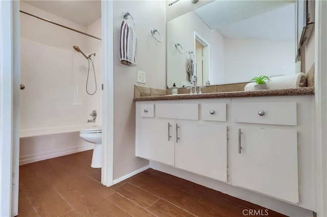 7302 Bright Ave Unit B, Whittier, CA 90602 - full bathroom with vanity, wood finished floors, and bathing tub / shower combination