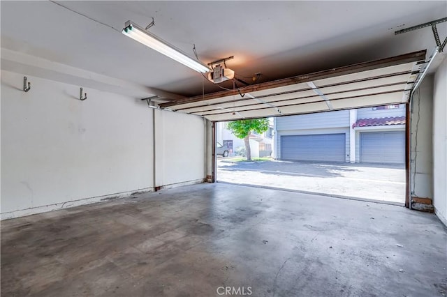 7302 Bright Ave Unit B, Whittier, CA 90602 - garage featuring a garage door opener