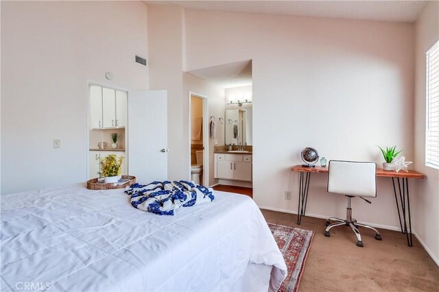 7302 Bright Ave Unit B, Whittier, CA 90602 - bedroom featuring light colored carpet, ensuite bath, and high vaulted ceiling