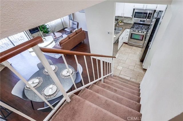 7302 Bright Ave Unit B, Whittier, CA 90602 - stairway featuring stone tile floors