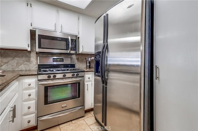7302 Bright Ave Unit B, Whittier, CA 90602 - kitchen featuring stainless steel appliances, white cabinets, tasteful backsplash, and stone counters
