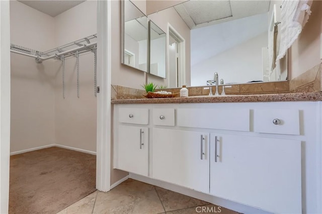 7302 Bright Ave Unit B, Whittier, CA 90602 - bathroom with vanity and a walk in closet