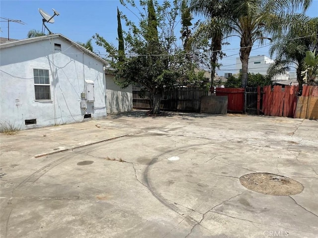 11250 Victory Blvd, North Hollywood, CA 91606 - view of home's exterior featuring a patio, stucco siding, and crawl space