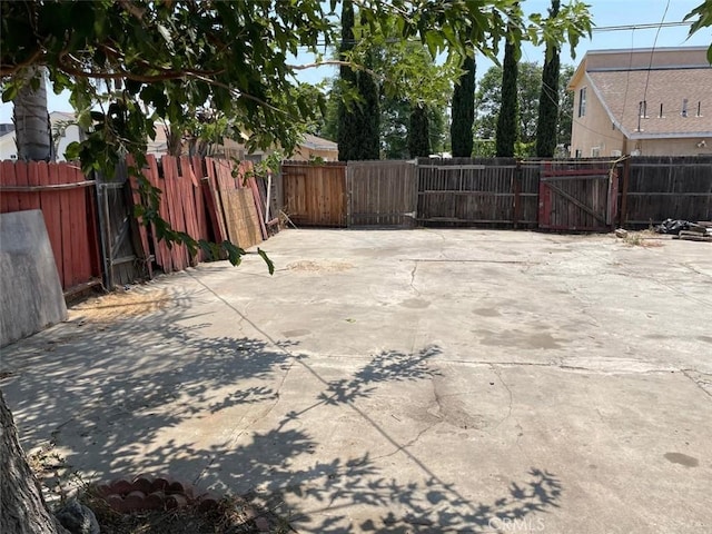 11250 Victory Blvd, North Hollywood, CA 91606 - fenced backyard featuring a gate and a patio