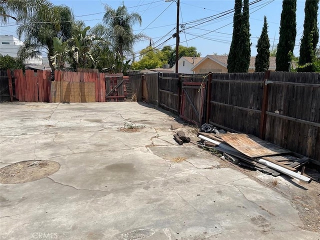11250 Victory Blvd, North Hollywood, CA 91606 - fenced backyard featuring a gate and a patio