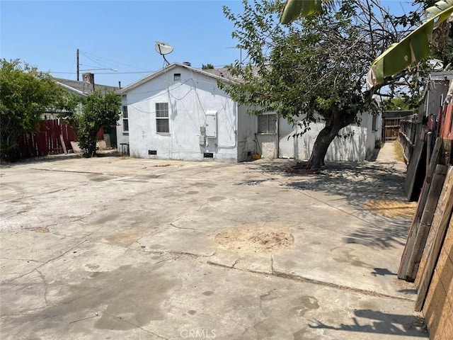 11250 Victory Blvd, North Hollywood, CA 91606 - rear view of property with crawl space and concrete driveway