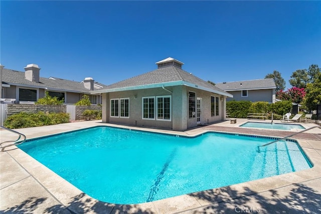 23130 Yvette Ln, Valencia, CA 91355 - community pool with a community hot tub and a patio area