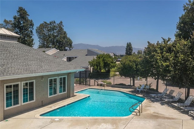 23130 Yvette Ln, Valencia, CA 91355 - community pool featuring a patio and a mountain view