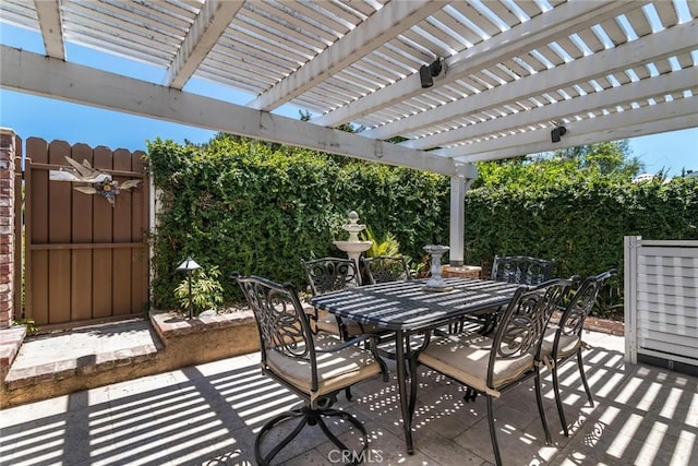 23130 Yvette Ln, Valencia, CA 91355 - view of patio / terrace featuring outdoor dining space and a pergola