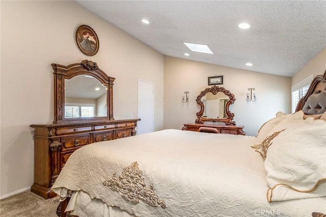 23130 Yvette Ln, Valencia, CA 91355 - bedroom with vaulted ceiling, carpet, a skylight, multiple windows, and recessed lighting