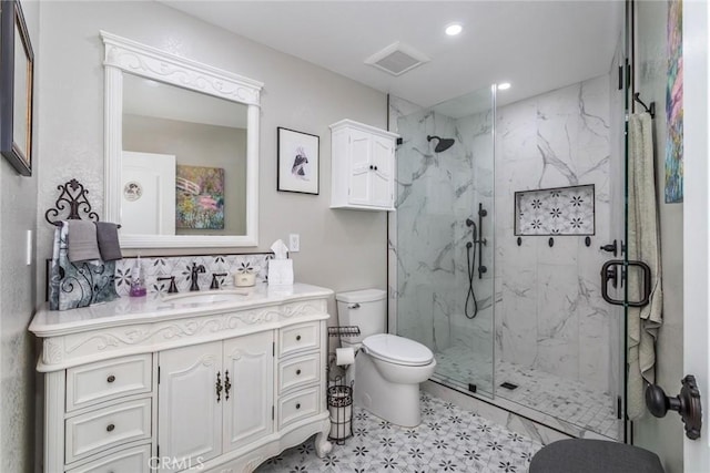 23130 Yvette Ln, Valencia, CA 91355 - bathroom featuring a marble finish shower, vanity, and recessed lighting