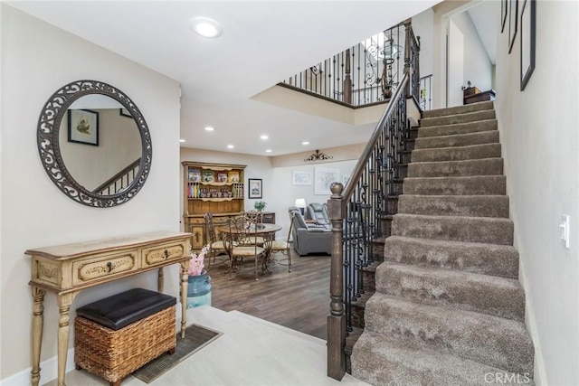 23130 Yvette Ln, Valencia, CA 91355 - stairway featuring wood finished floors and recessed lighting