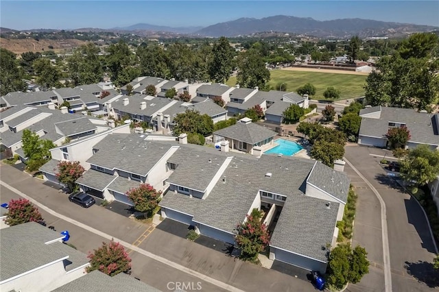 23130 Yvette Ln, Valencia, CA 91355 - aerial perspective of suburban area with mountains and a pool