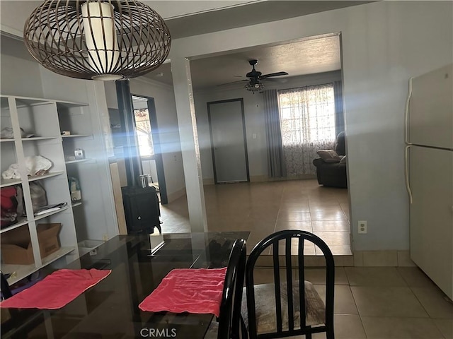 3938 Kreuer Rd, Phelan, CA 92371 - dining space with tile patterned floors and a ceiling fan