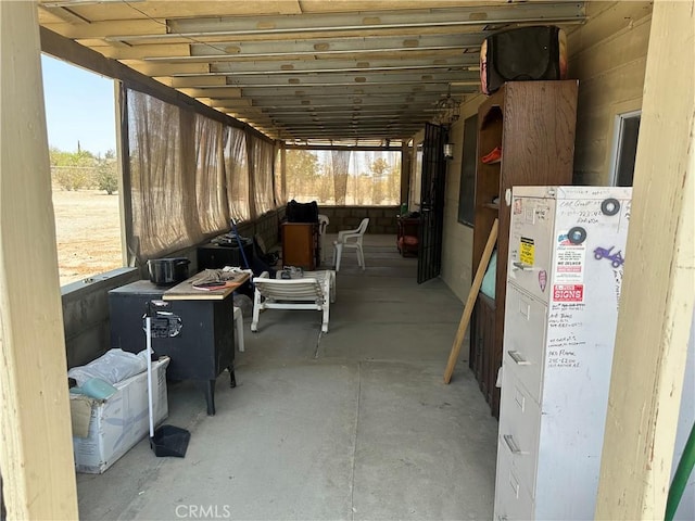 3938 Kreuer Rd, Phelan, CA 92371 - miscellaneous room featuring concrete floors
