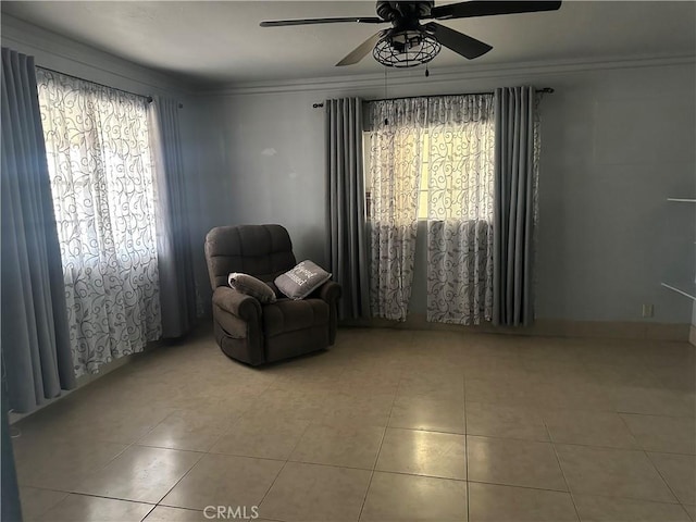 3938 Kreuer Rd, Phelan, CA 92371 - sitting room with ceiling fan, tile patterned flooring, and ornamental molding