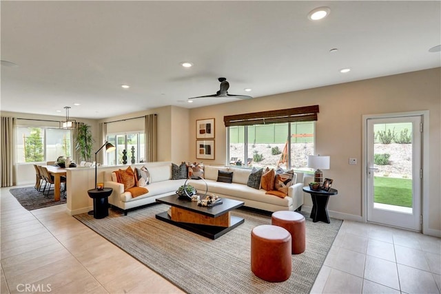 17163 Kent St, Hesperia, CA 92345 - living room with healthy amount of natural light, recessed lighting, light tile patterned flooring, and a ceiling fan