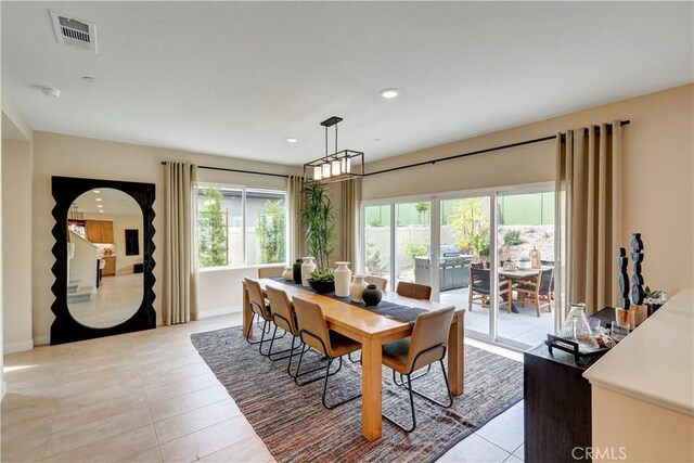 17163 Kent St, Hesperia, CA 92345 - dining room with healthy amount of natural light, light tile patterned floors, and recessed lighting