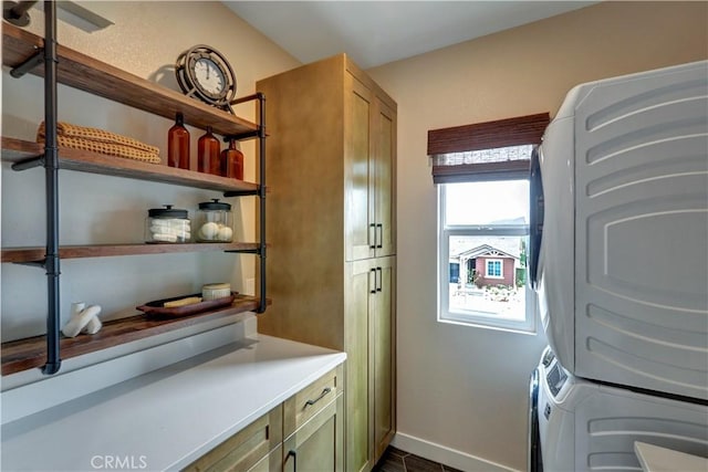 17163 Kent St, Hesperia, CA 92345 - washroom with cabinet space and stacked washing machine and dryer