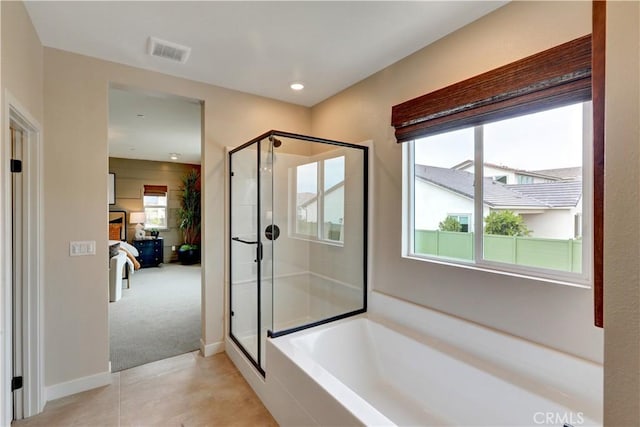 17163 Kent St, Hesperia, CA 92345 - ensuite bathroom with a shower stall, a bath, tile patterned floors, and recessed lighting