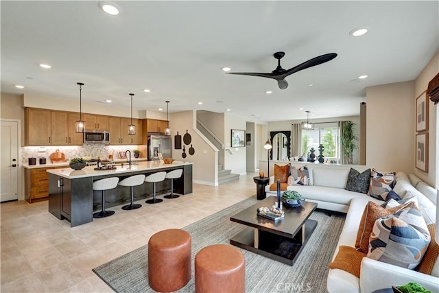 17163 Kent St, Hesperia, CA 92345 - living area featuring recessed lighting, stairway, ceiling fan, and light tile patterned floors