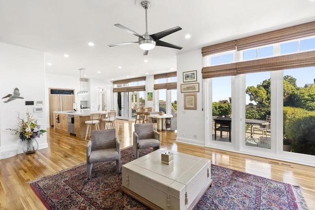 6815 La Jolla Scenic Dr, La Jolla, CA 92037 - living room with light wood-style floors, ceiling fan, and recessed lighting