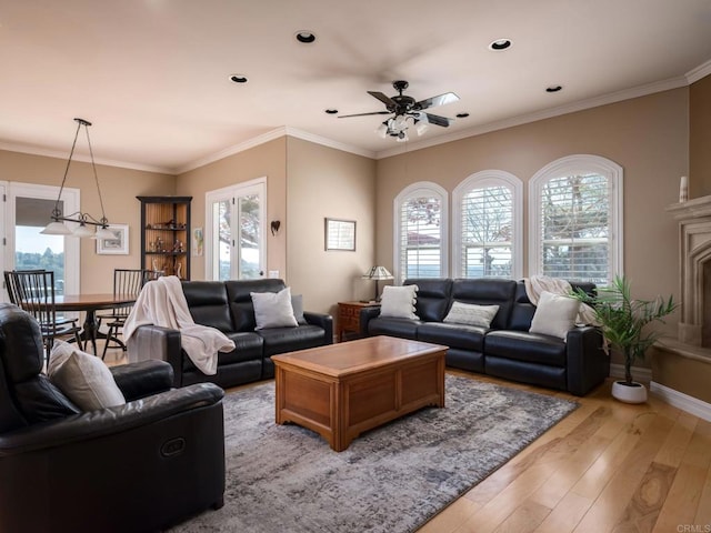 30419 Canyon Estates Rd, Vista, CA 92084 - living area featuring plenty of natural light, light wood finished floors, a ceiling fan, recessed lighting, and crown molding