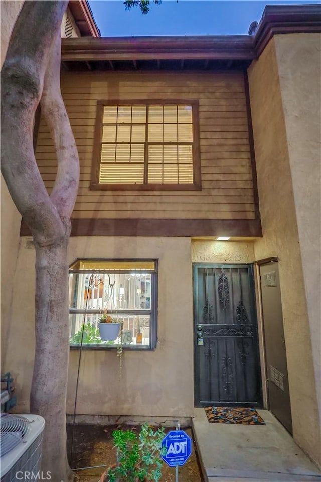 4140 Workman Mill Rd Unit 78, Whittier, CA 90601 - doorway to property featuring stucco siding