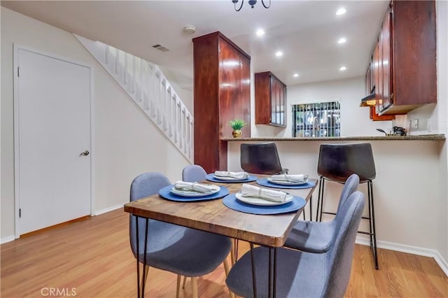 4140 Workman Mill Rd Unit 78, Whittier, CA 90601 - dining space featuring stairway, light wood-style floors, and recessed lighting