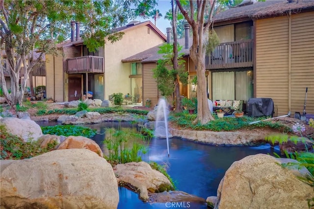 4140 Workman Mill Rd Unit 78, Whittier, CA 90601 - view of property's community featuring a small pond
