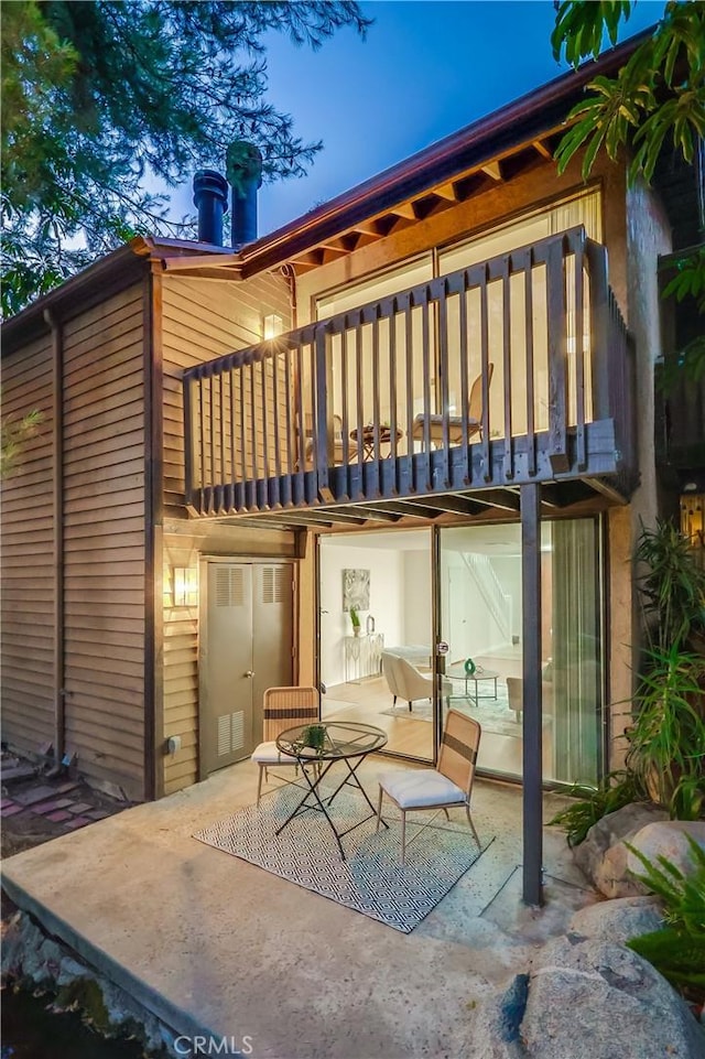 4140 Workman Mill Rd Unit 78, Whittier, CA 90601 - back of property featuring a balcony and a patio area