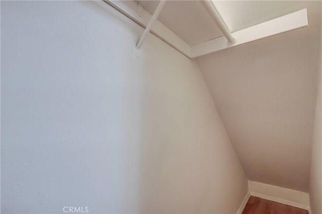 4140 Workman Mill Rd Unit 78, Whittier, CA 90601 - walk in closet featuring wood finished floors