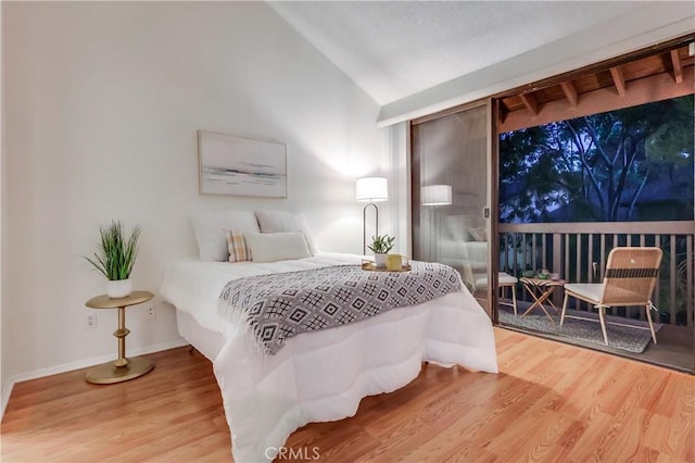 4140 Workman Mill Rd Unit 78, Whittier, CA 90601 - bedroom featuring access to outside, wood finished floors, and vaulted ceiling