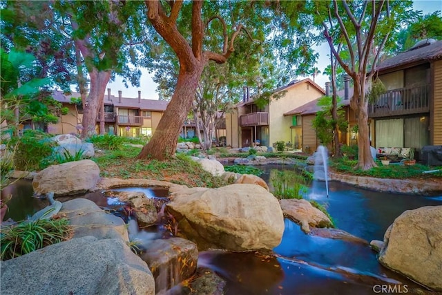 4140 Workman Mill Rd Unit 78, Whittier, CA 90601 - surrounding community featuring a garden pond and a residential view