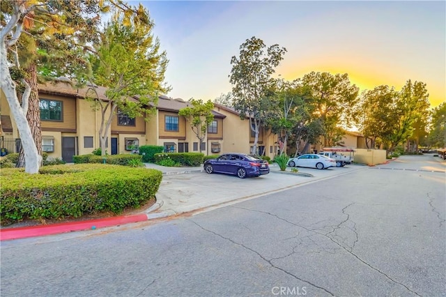 4140 Workman Mill Rd Unit 78, Whittier, CA 90601 - view of front of home featuring uncovered parking and stucco siding