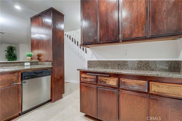 4140 Workman Mill Rd Unit 78, Whittier, CA 90601 - kitchen with dishwasher, light stone counters, and light tile patterned flooring