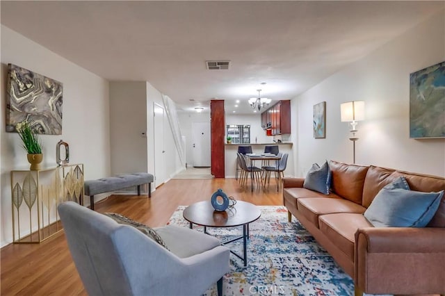 4140 Workman Mill Rd Unit 78, Whittier, CA 90601 - living area with a chandelier and light wood-style floors