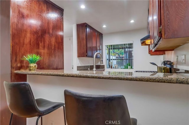4140 Workman Mill Rd Unit 78, Whittier, CA 90601 - kitchen featuring recessed lighting, stone counters, and premium range hood