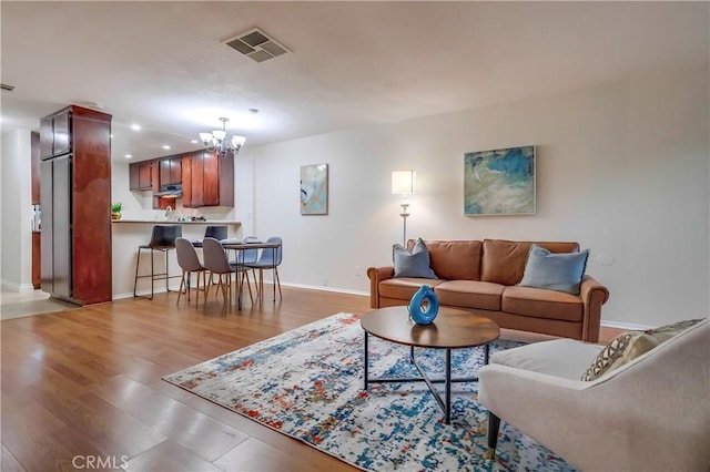 4140 Workman Mill Rd Unit 78, Whittier, CA 90601 - living room with a chandelier, light wood finished floors, and recessed lighting