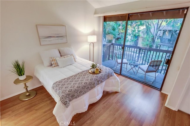 4140 Workman Mill Rd Unit 78, Whittier, CA 90601 - bedroom featuring access to outside and wood finished floors