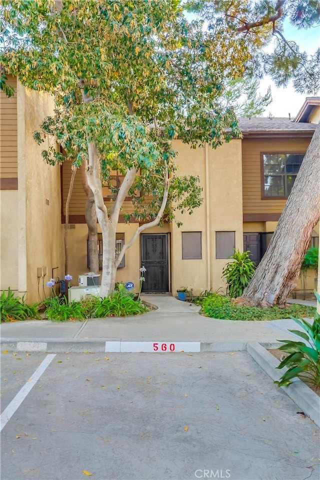 4140 Workman Mill Rd Unit 78, Whittier, CA 90601 - view of building exterior featuring uncovered parking