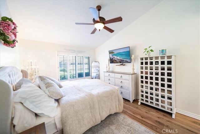 5260 W Palmer Dr, Banning, CA 92220 - bedroom featuring wood finished floors, a ceiling fan, and high vaulted ceiling