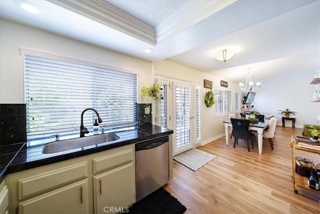 5260 W Palmer Dr, Banning, CA 92220 - kitchen featuring dishwasher, light wood finished floors, tile counters, a chandelier, and crown molding