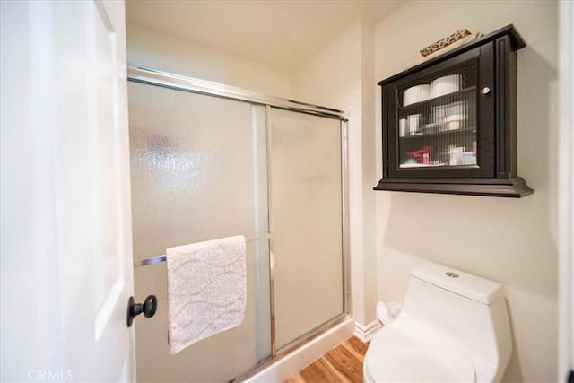 5260 W Palmer Dr, Banning, CA 92220 - full bath featuring a stall shower and wood finished floors