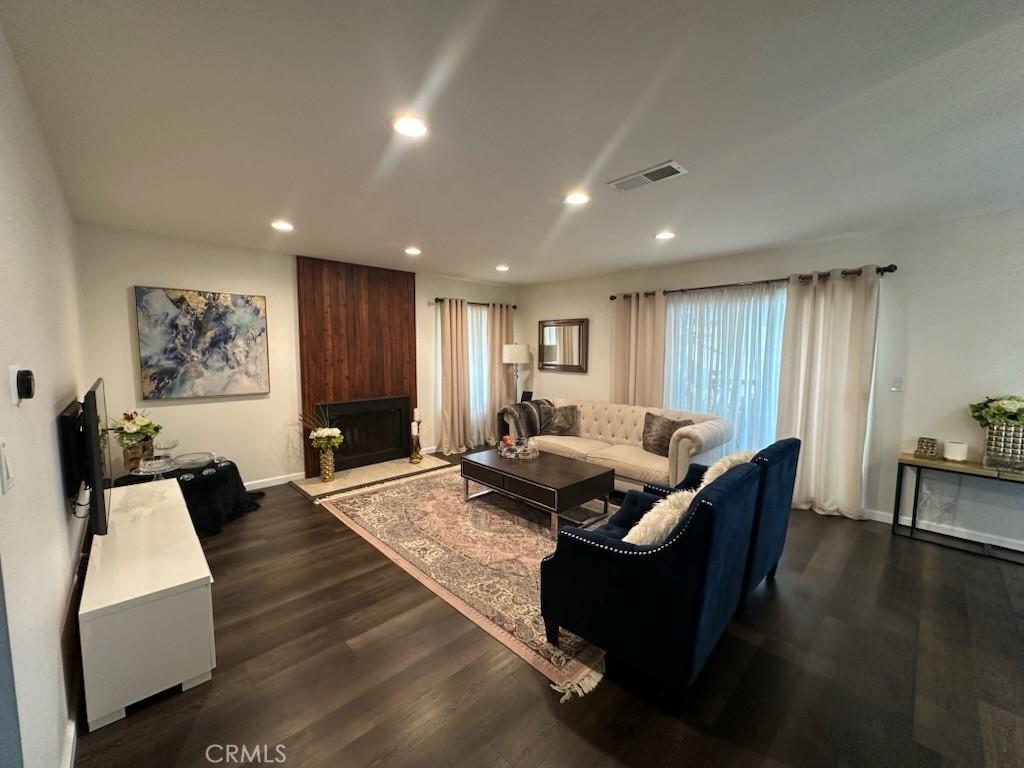 450 W Vermont Ave Unit 1104, Escondido, CA 92025 - living area featuring recessed lighting, dark wood-type flooring, and a large fireplace