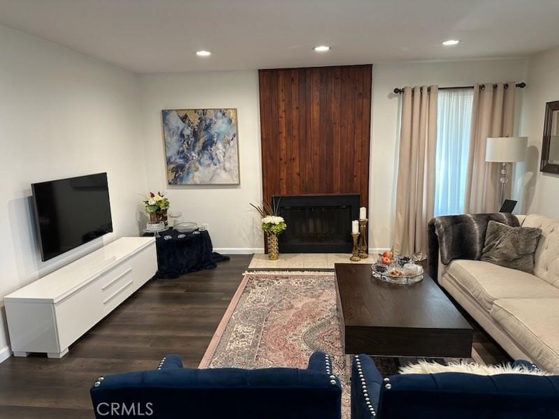 450 W Vermont Ave Unit 1104, Escondido, CA 92025 - living area featuring recessed lighting, dark wood finished floors, and a large fireplace