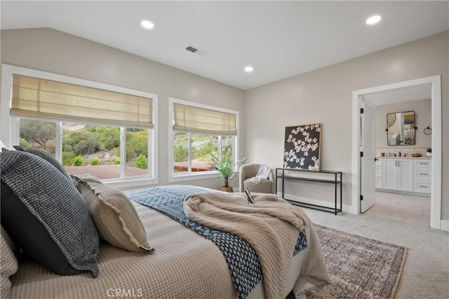 5025 Stonehaven Dr, Yorba Linda, CA 92887 - bedroom featuring light colored carpet, recessed lighting, connected bathroom, and vaulted ceiling