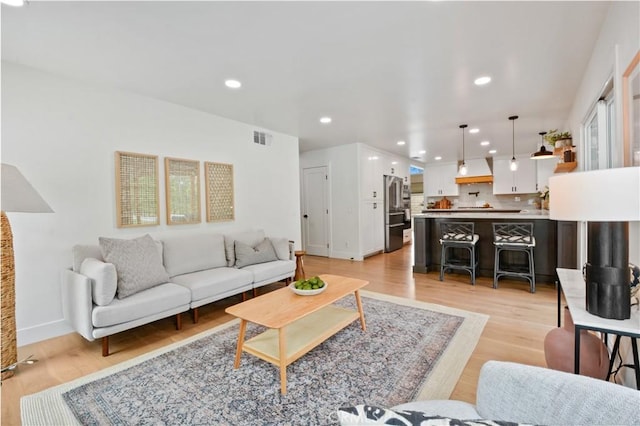 5025 Stonehaven Dr, Yorba Linda, CA 92887 - living room featuring light wood finished floors and recessed lighting
