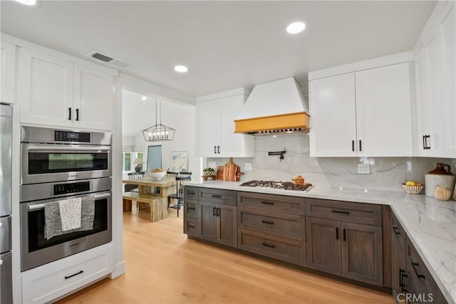 5025 Stonehaven Dr, Yorba Linda, CA 92887 - kitchen featuring premium range hood, stainless steel appliances, white cabinets, and recessed lighting