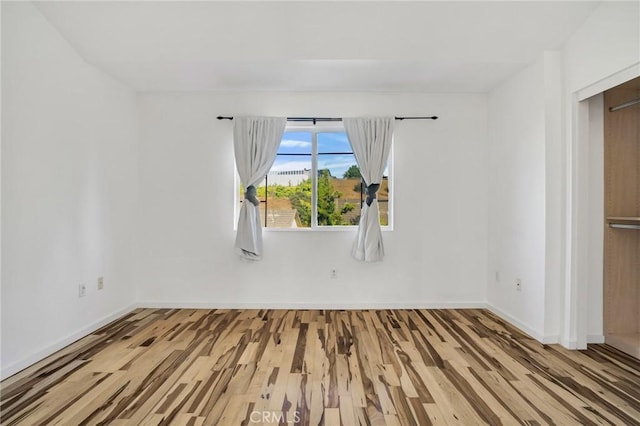 4600 Don Lorenzo Dr Unit 20, Los Angeles, CA 90008 - unfurnished room with wood finished floors and baseboards
